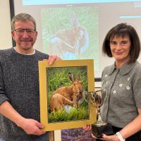 Andreas Riemenschneider with Claire Callagy and the winning photograph - Absent is the winnder Philip Smyth